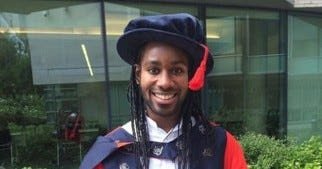 Man standing in cambridge england costume
